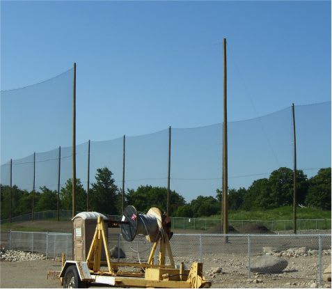 guy wire feeder - netting installation golf course